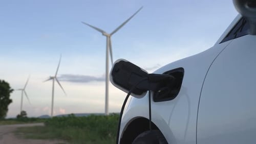 Progressive Combination of EV Car Charging Station and Wind Turbine