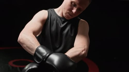 Boxer Practicing Punches During Boxing Training