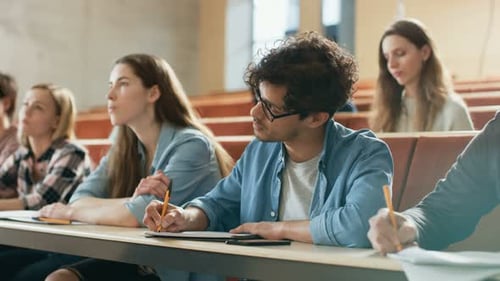 Students Taking Notes in College Lecture Hall