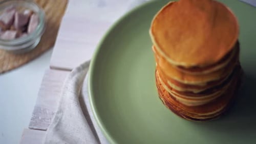Golden Pancakes Stacked on Plate Food Still Life