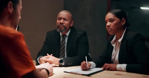 Police, criminal and question in interrogation room for investigation, discussion or arrest