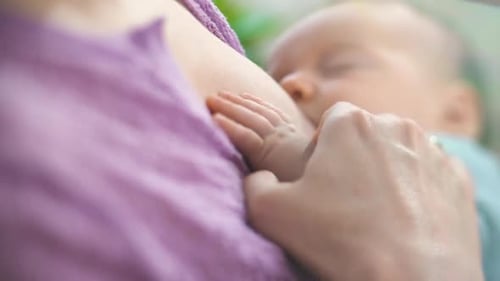 Mother Breastfeeding Baby Close Up