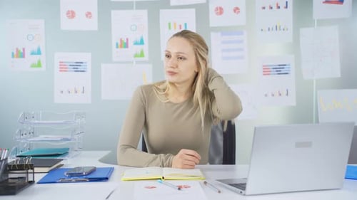 Stressed Young Adult Talking in Modern Office