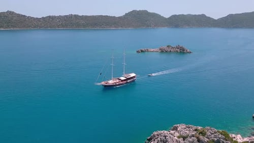 Sailing Yacht Cruising on Tropical Turquoise Ocean