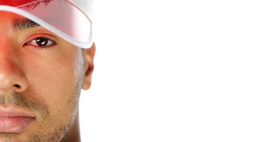 4k video footage of a young man wearing a visor against a white background