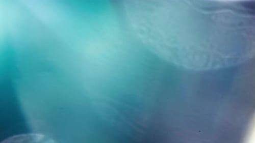 Teal and White Gradient with Textured Motion