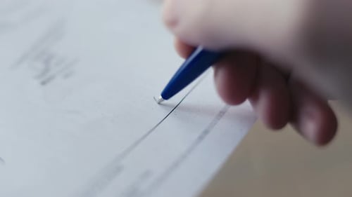 Person Signs a Paper Contract with a Pen Getting a Job Buying Real Estate or a Car Business Contract