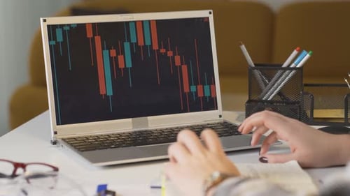 Cryptocurrency chart, thoughtful woman.