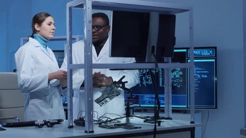 Engineers Working Together with Technology in a Lab