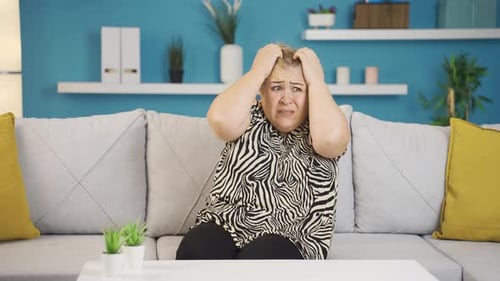Woman with Psychological Problems alone at home.