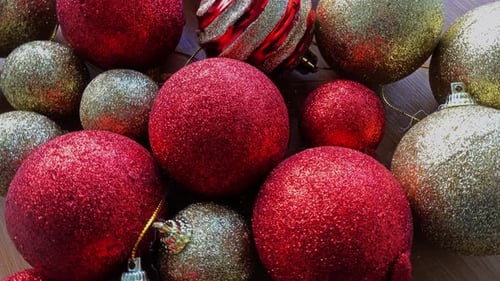 Close Up of Golden and Red Christmas Balls on a Christmas Background