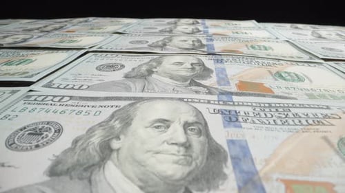 Pile of american dollars cash money put in a row, inflation concept. Closeup new american one hundre