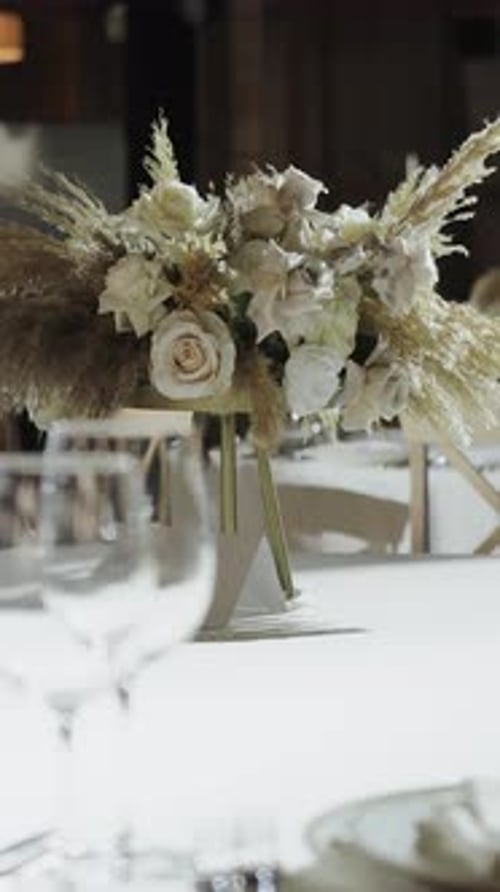 Elegant Wedding Reception with Beautiful Table Setup and Flowers Decorated Tables Banquet Hall