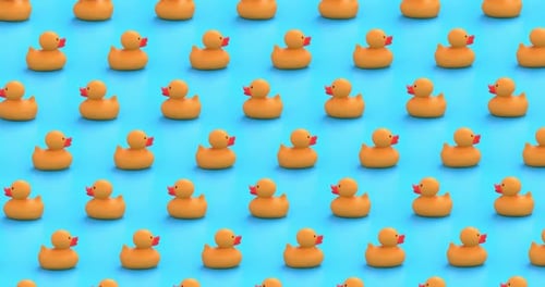 Big Yellow Rubber Ducks Move Left And Right In Rows Seamlessly In A Orthographic View
