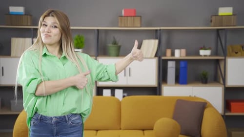 Young Woman Gesturing Positively in Living Room