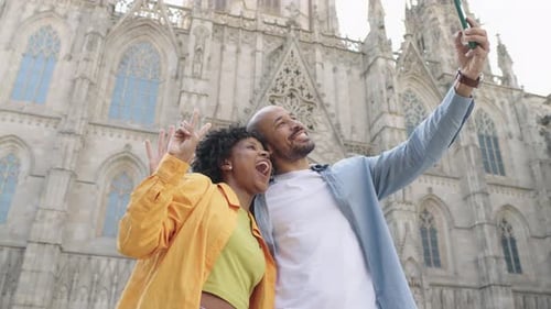 Tourists Taking Selfies in Front of Barcelona Cathedral