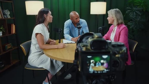 Professional podcasters recording interview