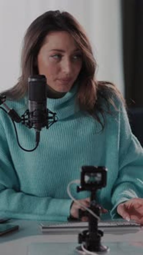 Woman Recording Podcast or Streaming from Home