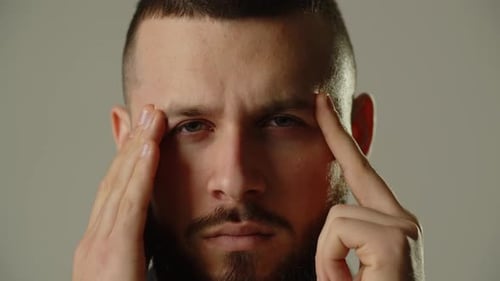 Bearded Man Massaging Temples, Headache
