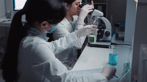 Scientists Work in Modern Bright Lab