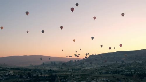Hot Air Balloons Fly Over Cappadocia at Sunrise
