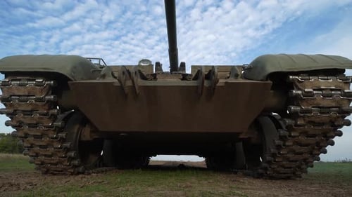 Menacing Military Tank Stationary in a Rural Setting
