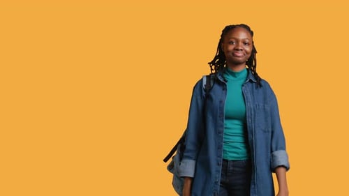 Cheerful Student Witch School Rucksack Doing Greeting Hand Gesture