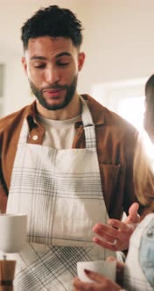 Loving Couple Sharing Coffee in Bright Home