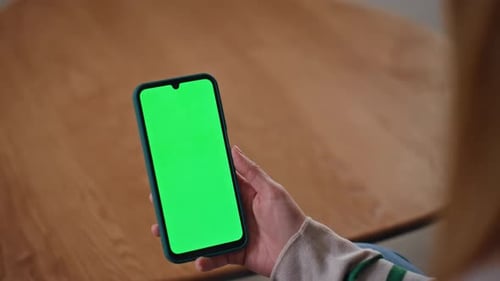 Girl Hands Swiping Mockup Cellphone at Apartment Close Up Unrecognizable Woman