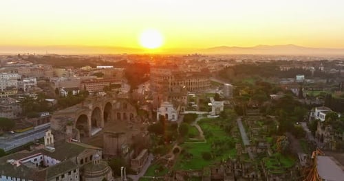 Aerial View of Iconic Ancient Arena of Colosseum at Sunset Flavian Amphitheatre in the Heart of Rome