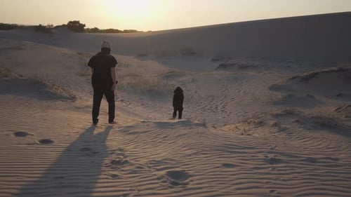 A man navigating the golden desert wilderness
