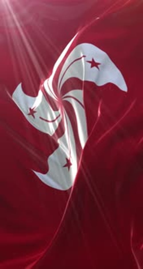 Hong Kong Flag Waving in the Wind with Sun Rays
