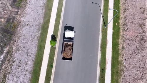 Dirt Removal Truck Drone Follow Construction Site