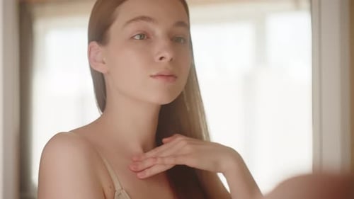 Woman Massaging Neck for Skin Care Routine