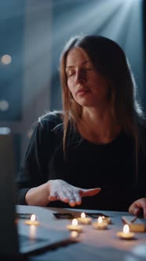 Woman Interpreting Tarot Cards by Candlelight