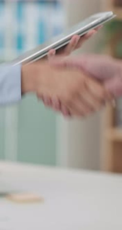 People, shaking hands and tablet in office with deal, contract and online agreement in business