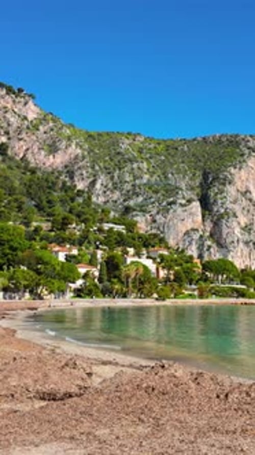 View of Beach Petite Afrique, in Beaulieu-sur-Mer, France. Vertical