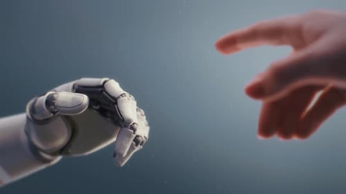 Visualisation d'un robot humanoïde et d'un humain se touchant le bout des doigts pour créer une lumière rougeoyante