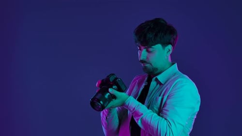 Backstage Photographer in Studio Shooting with Camera