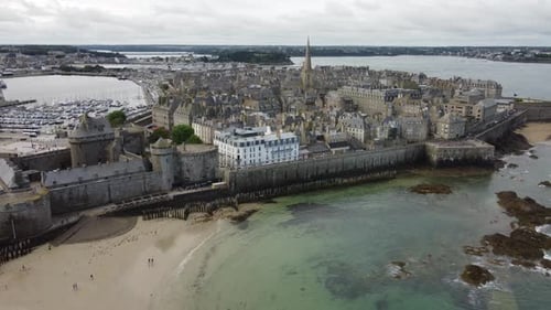 Saint-Malo city with medieval fortified castle and surrounding landscape, Brittany in France. Aerial