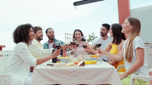 Group of Friends Toasting with Wine Outdoors
