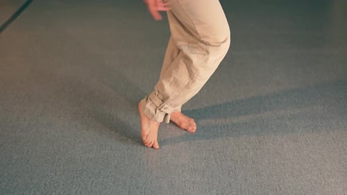 Woman Dancing Indoors in Studio Rehearsal