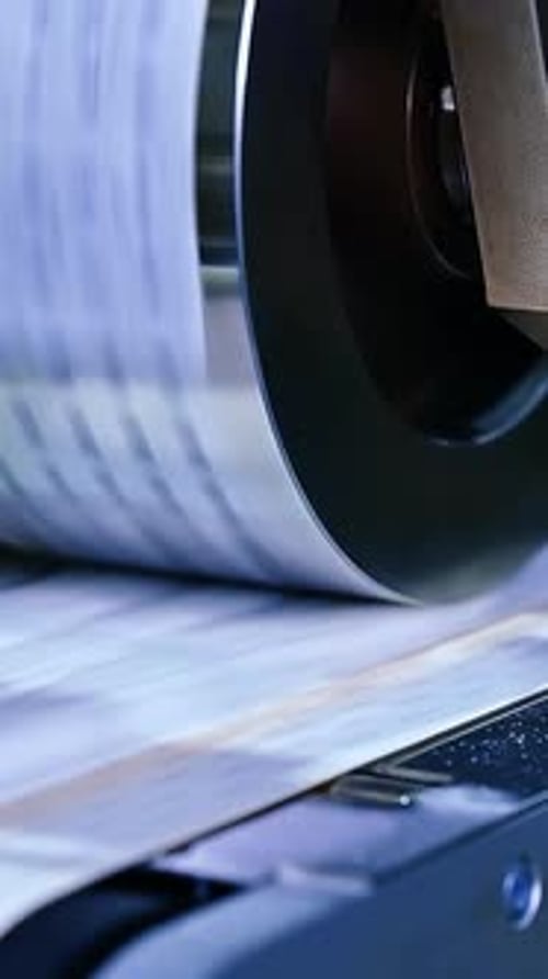 Machine Roller Smooths Materials in Close Up