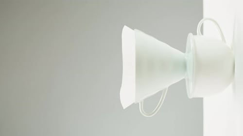 Coffee Grounds Being Added To Filter Close Up