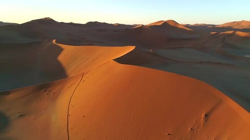 Namibian desert dunes at sunset, Aerial view
