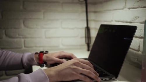 Man coding on laptop. Closeup of developer programmer, soffware engineer, IT support Vlad