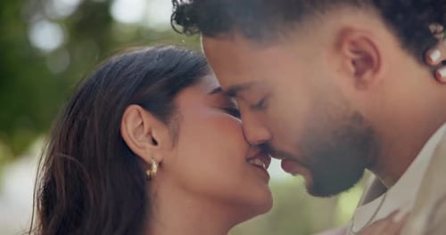 Romance, love and kiss with couple in park for embrace, loyalty and care together