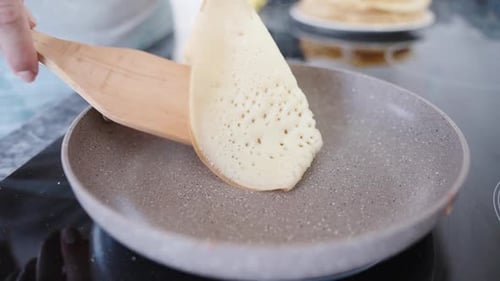 Cooking Pancakes on a Hot Plate at Home