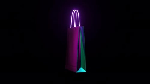 Bolsa de compras verde con luz de neón sobre fondo oscuro