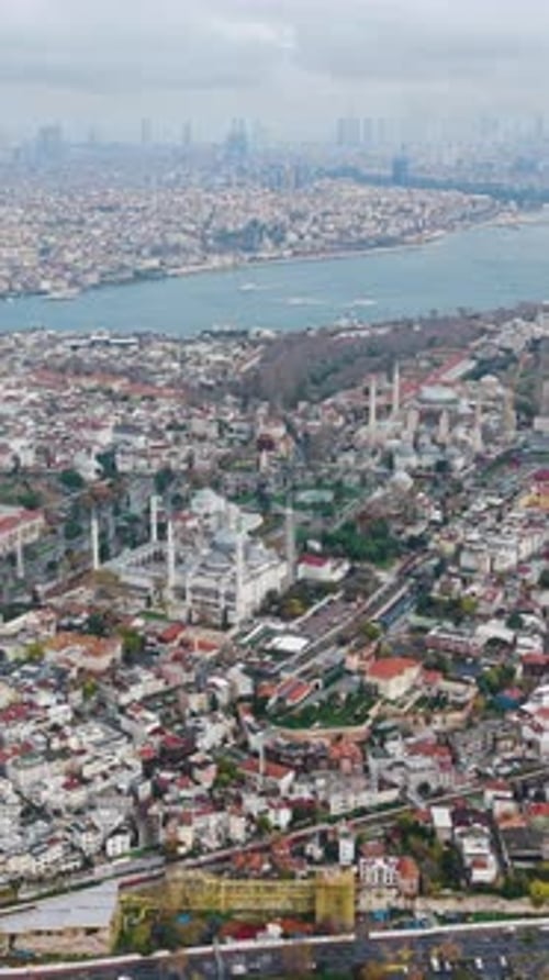 Vertical drone shot of Istanbul’s historic Sultanahmet district featuring the Blue Mosque, Turkey